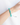 On-model view of the NOVA Bracelet in Arctic Waters, worn on the wrist to show size and fit, with cool green-blue amazonite beads and polished silver detailing catching the light.