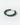 Close-up view of a handcrafted malachite beaded bracelet showcasing rich forest-green gemstones with signature striations. A diamond-studded 14k gold rondelle sits at the center, with tiny 14k gold spacer beads between each malachite bead. A 14k gold lobster clasp is partially visible.