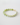 Detailed side view of serpentine bracelet showing variation in green tone, 14k gold accents, and toggle closure.