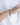 Side angle view of the Stardust Double Aquamarine Bracelet on the wrist, displaying the fluid drape and brilliant sparkle of its twin rows of faceted aquamarine gemstones and silver spacers.