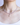 Close-up of model wearing a beaded necklace featuring faceted lilac amethyst and clear quart, accented by delicate silver spacer beads. The necklace features a center-set freshwater pearl pendant suspended from a diamond-set sterling silver bail.